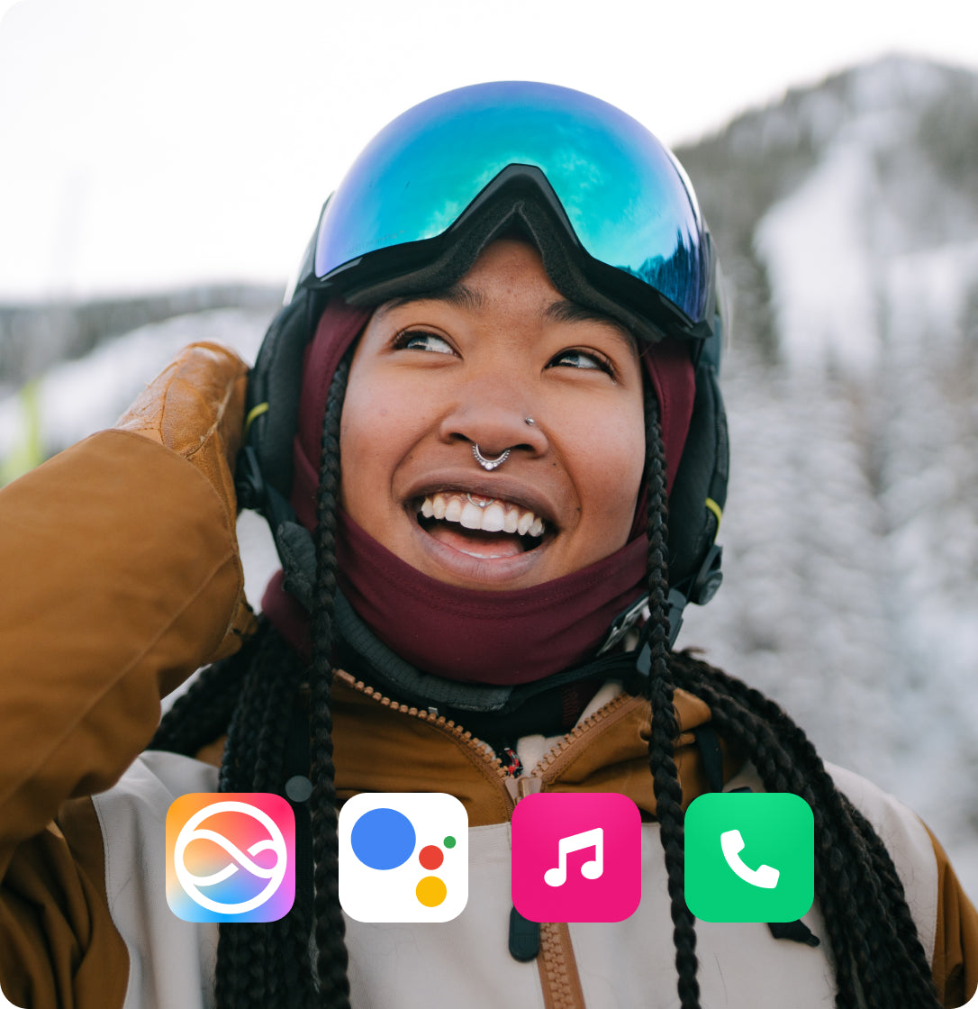 Skier using Aleck Nunchucks helmet speakers for audio and calls