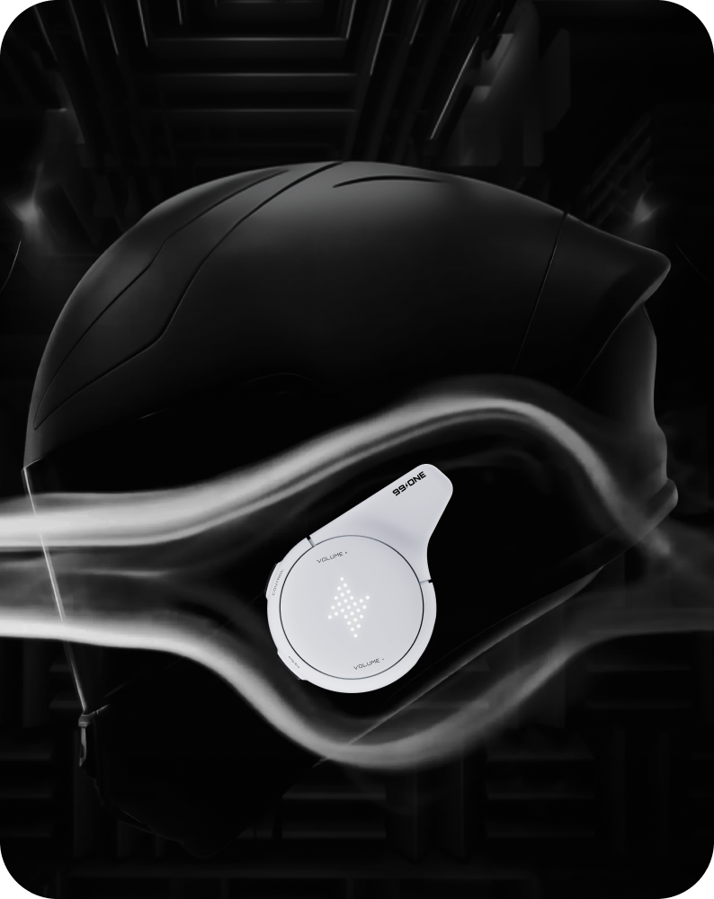 Black helmet with a white device attached on a dark background