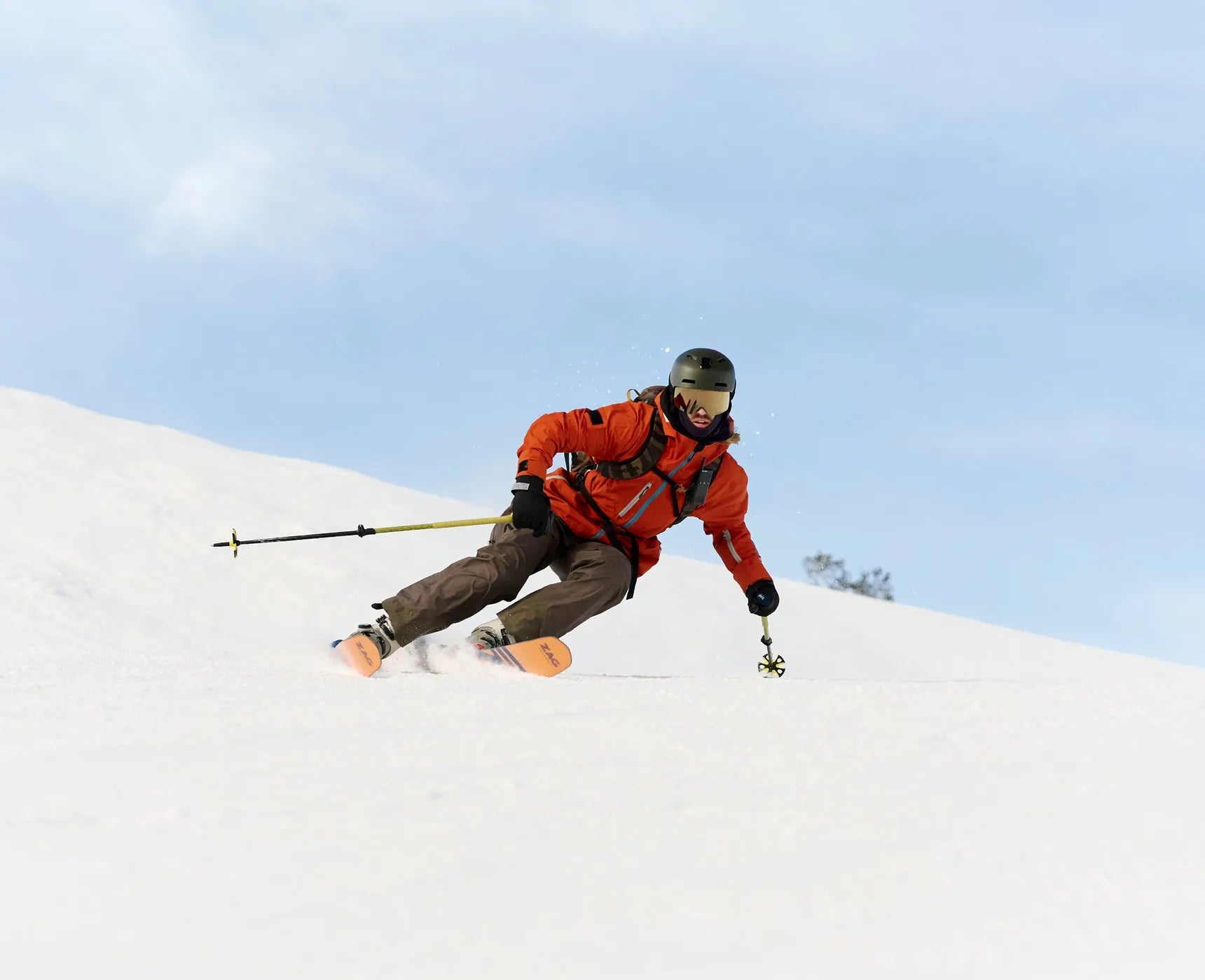 Snowboarder traversing a bright slope