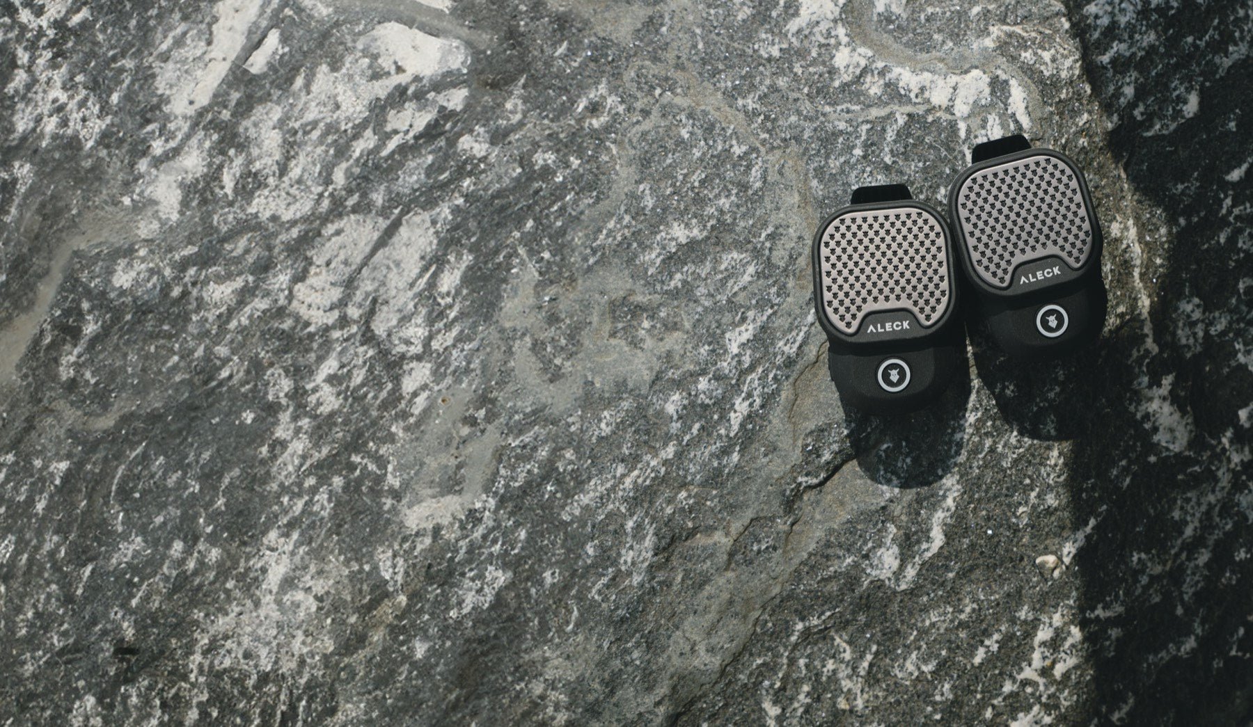 Aleck gear on granite, sound ring pulsing from the ROX